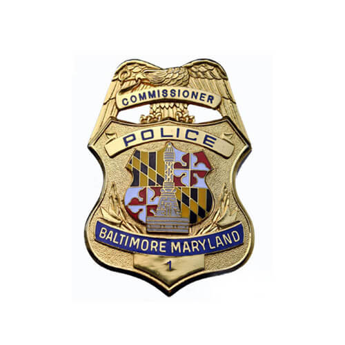 Gold police commissioner badge